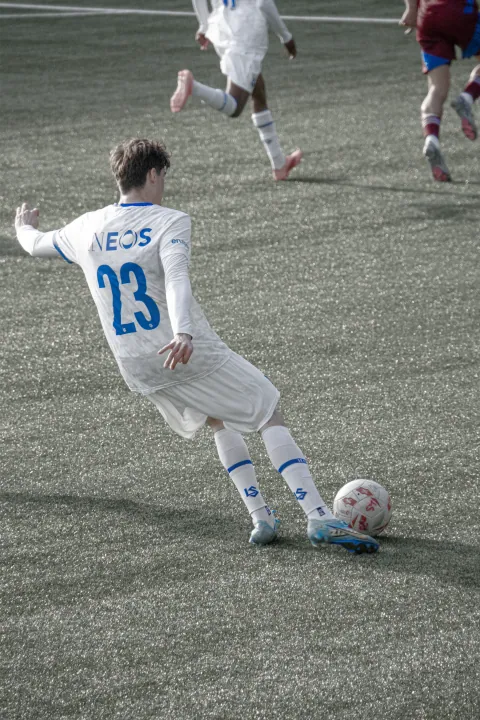Course balle au pied du numéro 23 en stade